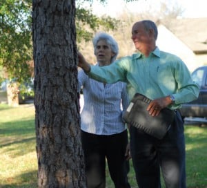 Scott Geer Master Arborist with a customer.
